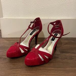 Red ankle strap high heel